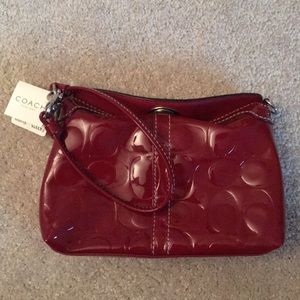 NWT Coach Factory Clutch Ruby Red